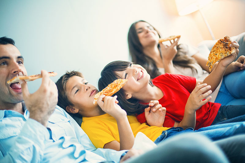 Family eating pizza